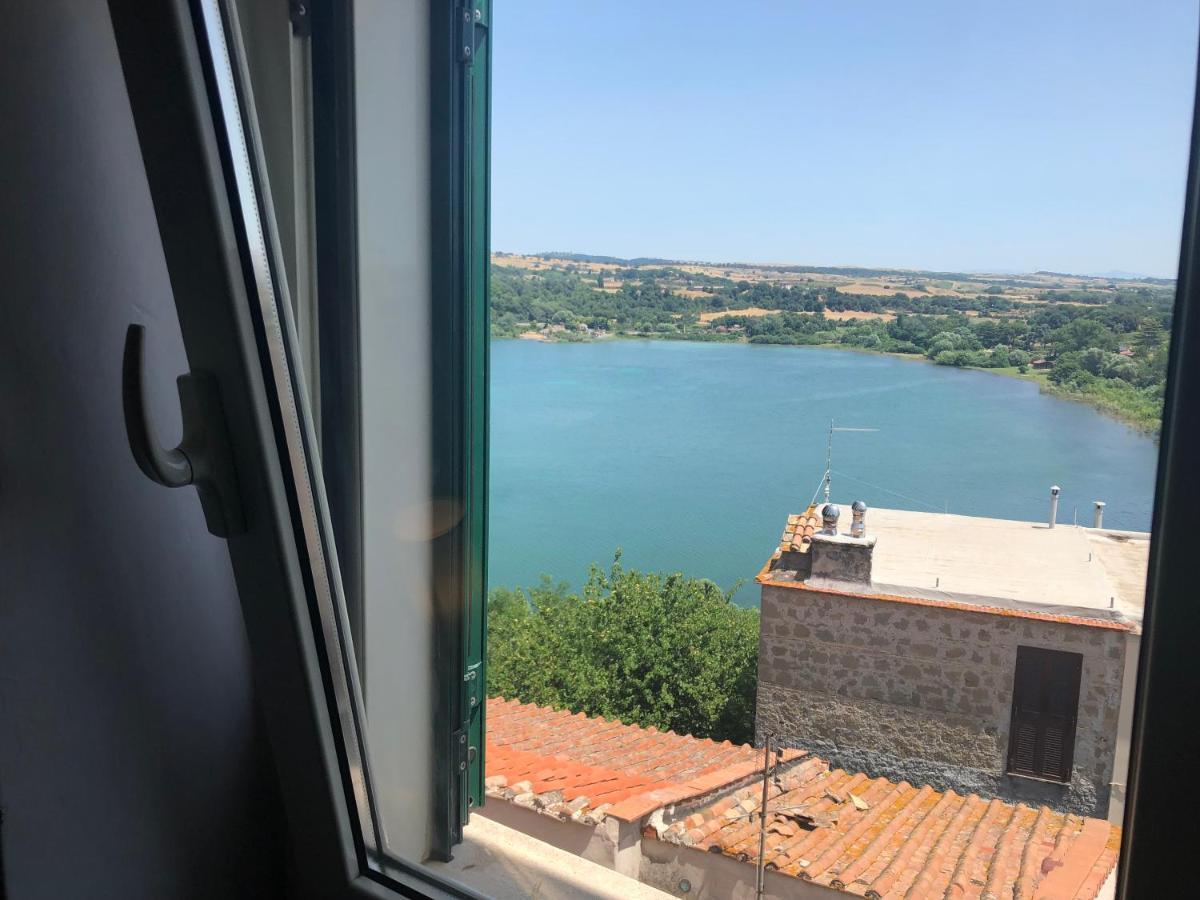 Attico Con Vista Lago - Miralago Anguillara Sabazia Bagian luar foto